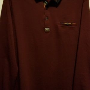 Burgundy polo shirt. Log sleeve. Size large fits f